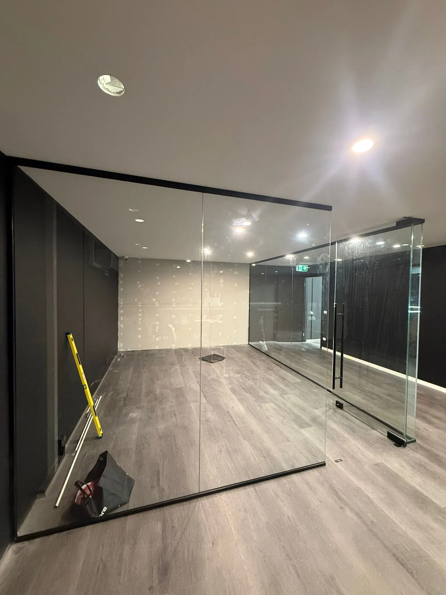 Frameless glass partition in a Melbourne home